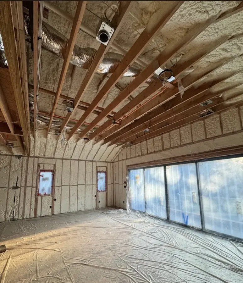 Interior walls and ceiling insulated with spray foam during new construction in West View